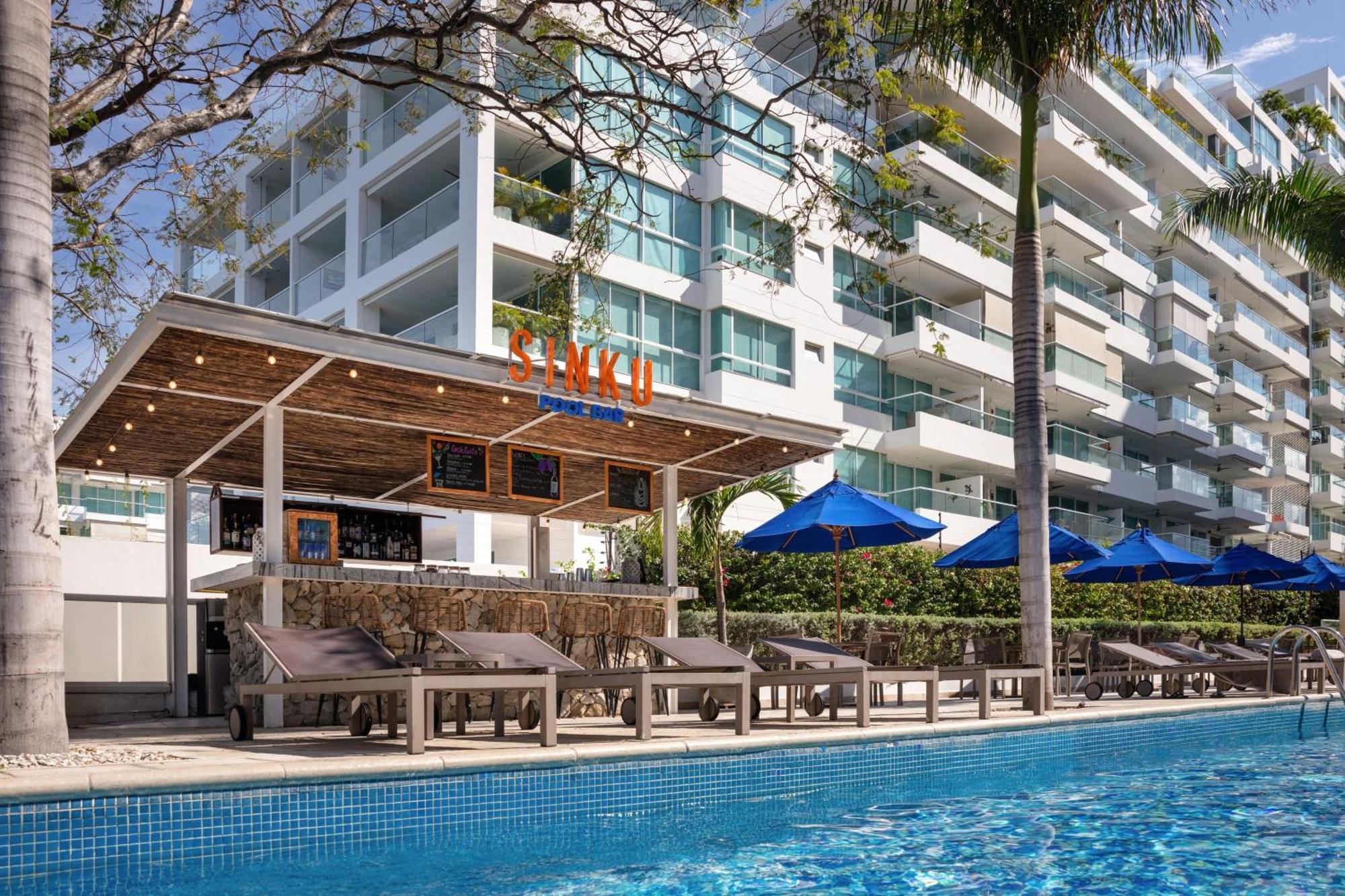 Santa Marta Marriott Resort Playa Dormida Zewnętrze zdjęcie The swimming pool at the hotel